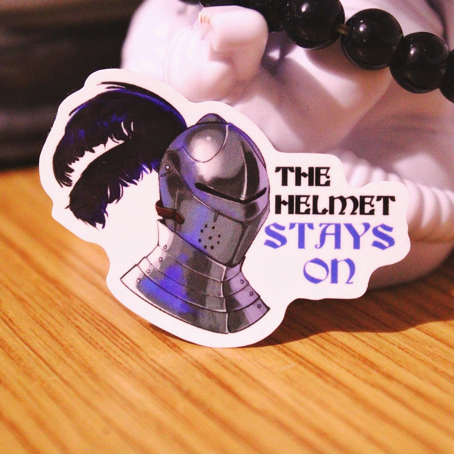 The Helmet Stays On Sticker