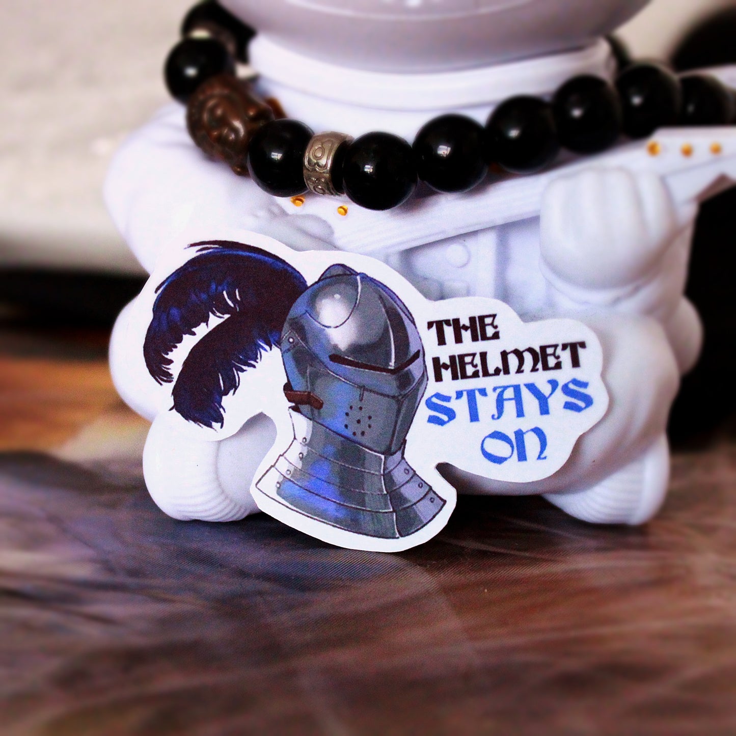 The Helmet Stays On Sticker